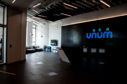 Unum empty foyer with bright sign on dark background