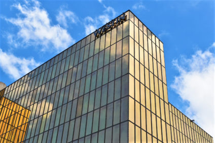 Westin Hotel building close-up featuring top of building and Westin channel letters