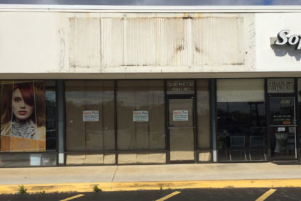 Closed business store front with missing sign