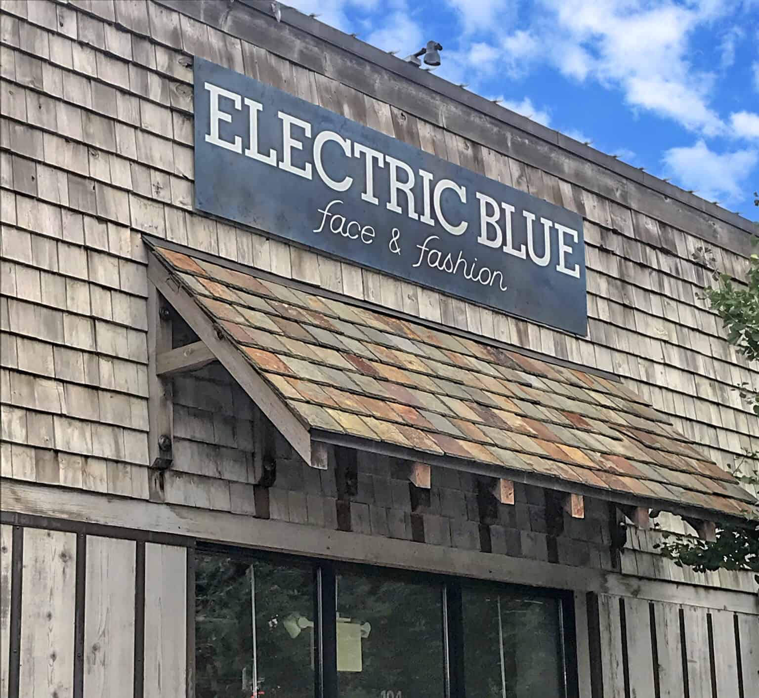 Electric Blue Collection facade with patina sign
