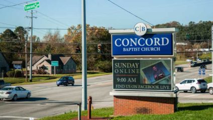 Concord Baptist Church sign at busy intersection