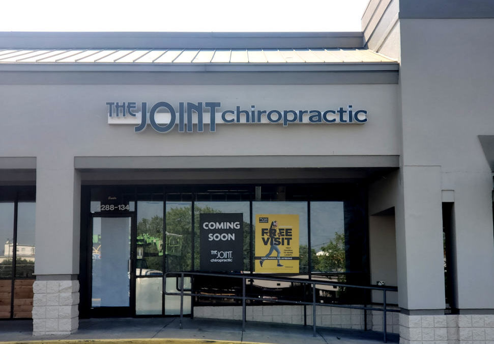 The Joint Chiropractic Channel Letters on Raceway on Facade of Commercial Business Property Building