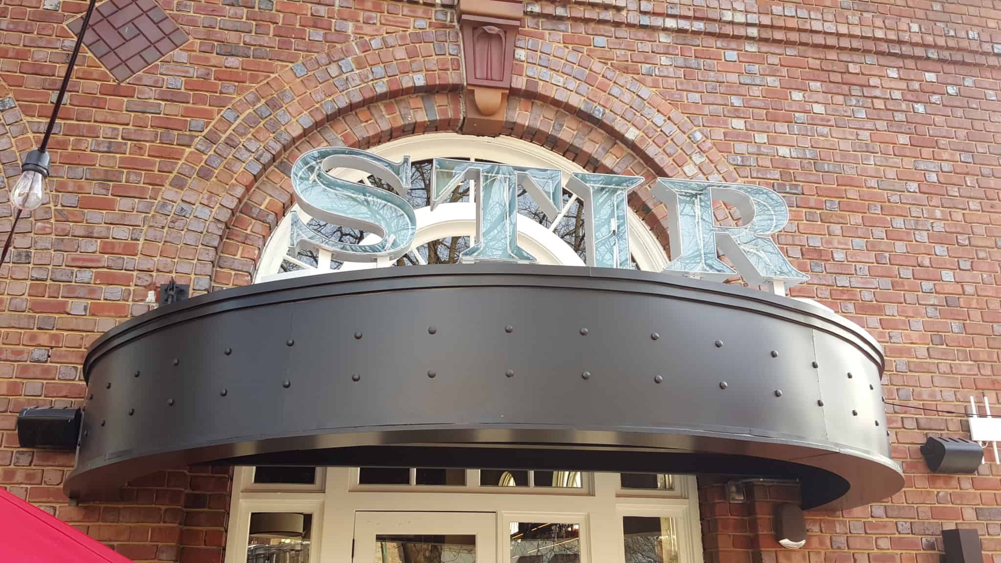 Stir sign above awning at the front of the Chattanooga Choo Choo