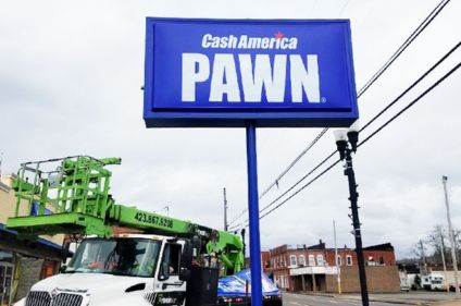 Cabinet Pan Face Sign installed by Ortwein Sign with crane beside the sign