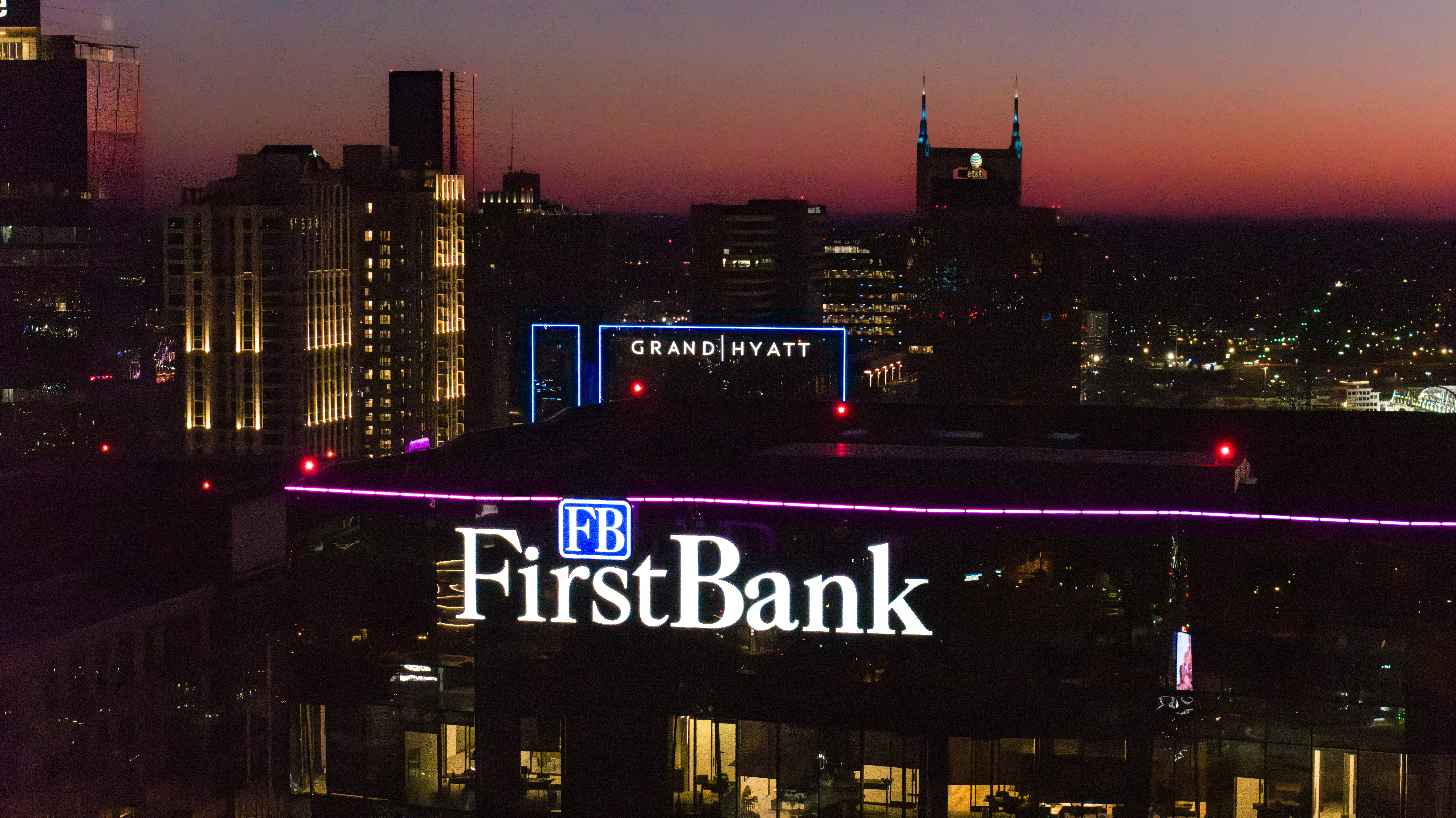 First Bank skyline sign fabricated and installed by Ortwein Sign